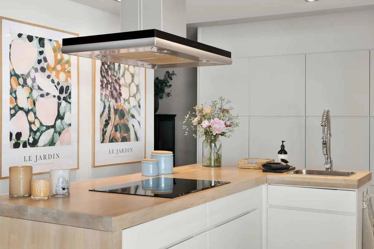 Kitchen island with an oak butcher block counter